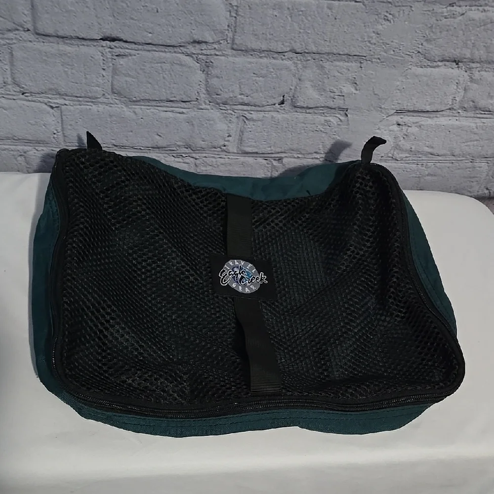Eagle Creek Dark Green and Black Mesh packing cube